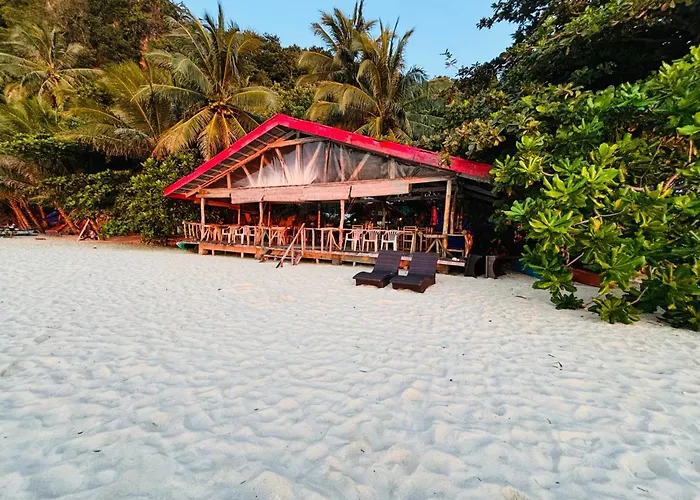 White Beach Front And Cottages